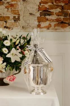 Cristina Oria Cajas Y Bolsas Gourmet|Cajas Y Bolsas Gourmet^Champanera de Plata y Champagne Bollinger