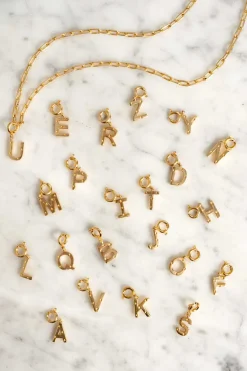 Cristina Oria Joyas Co|Joyas Co^Iniciales Doradas Con Detalle De Estrellas